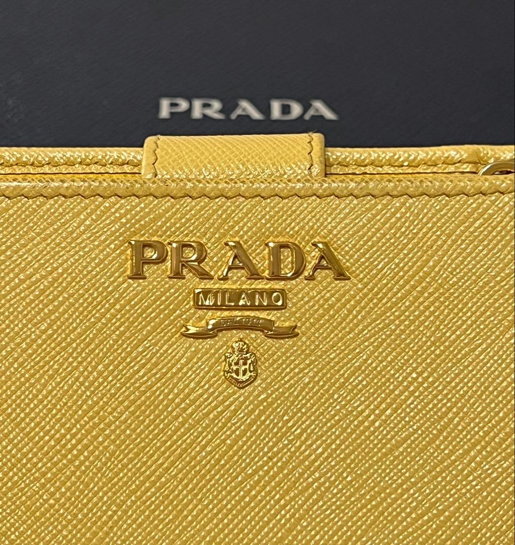 PRADA サフィアーノレザー 二つ折り財布（イエロー）【保証書•専用箱付】