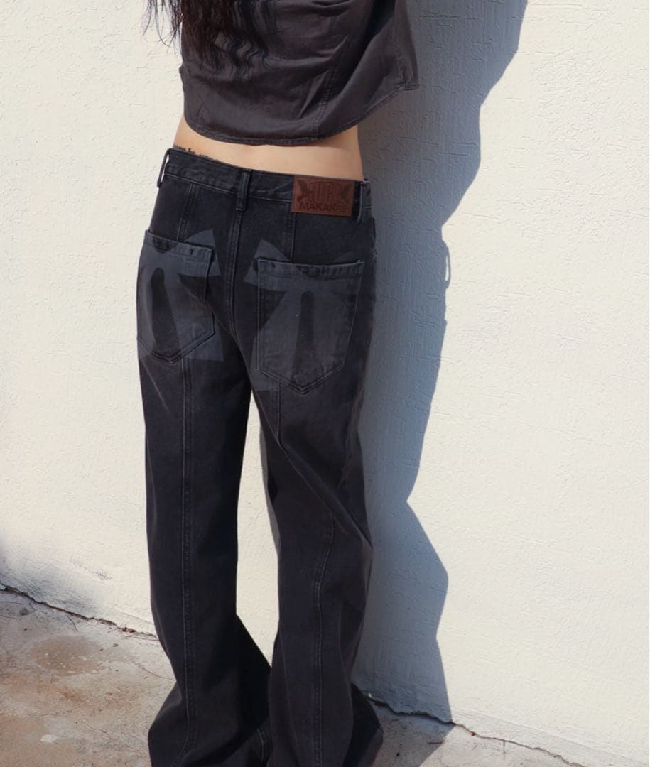 あめ　IUGAMAKARAS Ribbon Denim Pants