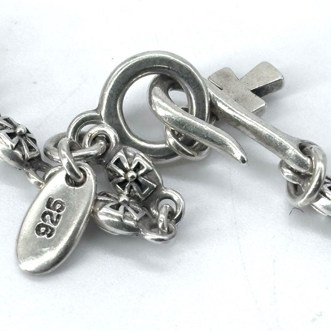 アクセサリー JUSTIN DAVIS CROSS WITH CROWN TINY CROSS