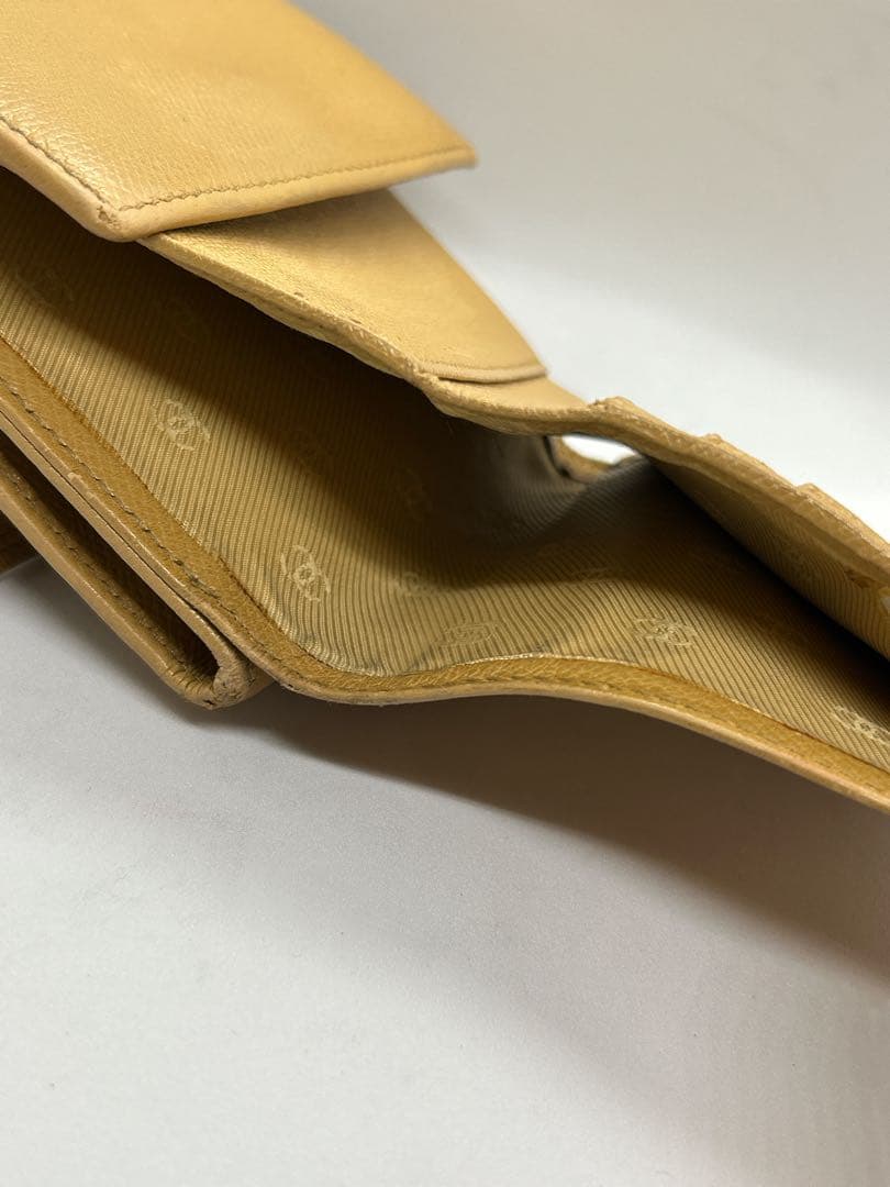 良品✨　シャネル　シリアル有　折り財布　イエロー　レザー　ココボタン/714