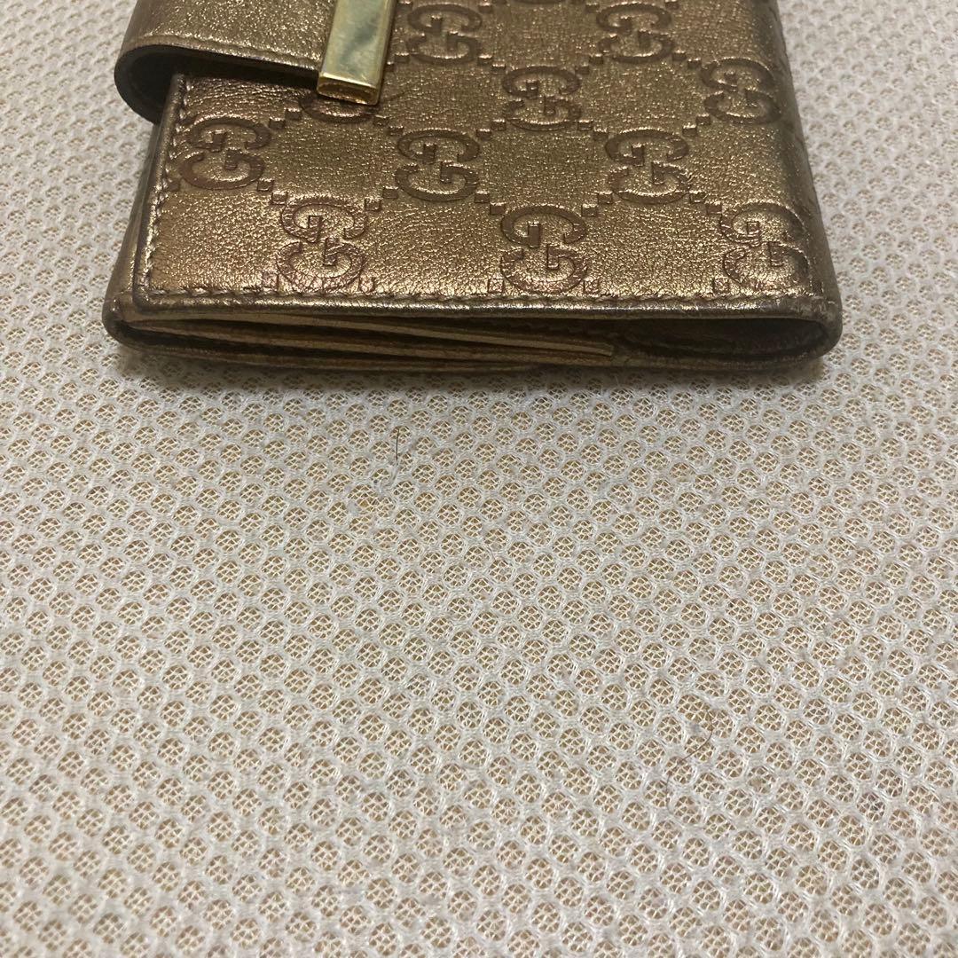 GUCCI グッチ メタリックゴールド GGパターン 二つ折り財布 レディース
