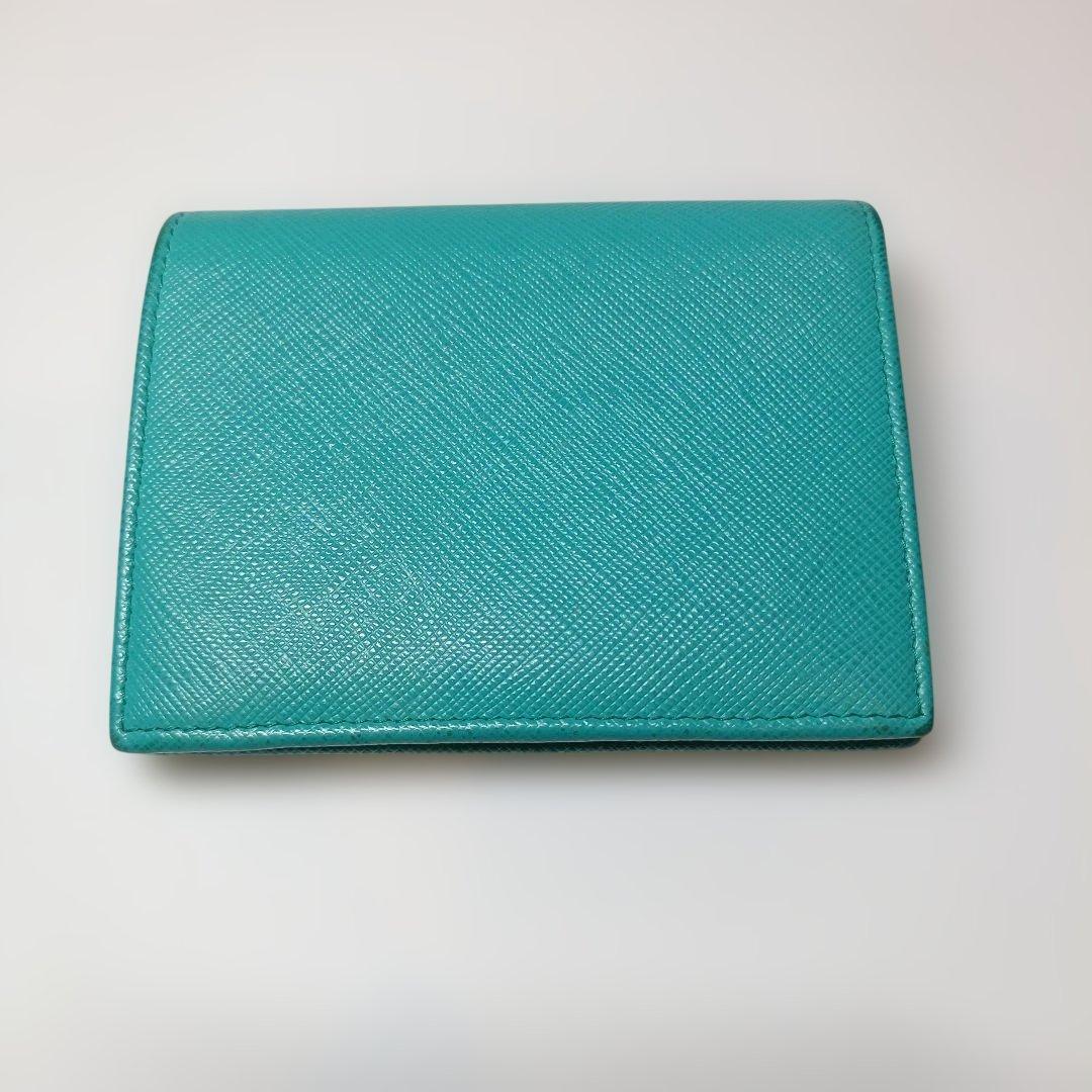 パ*ン様 PRADA ターコイズ 二つ折り財布