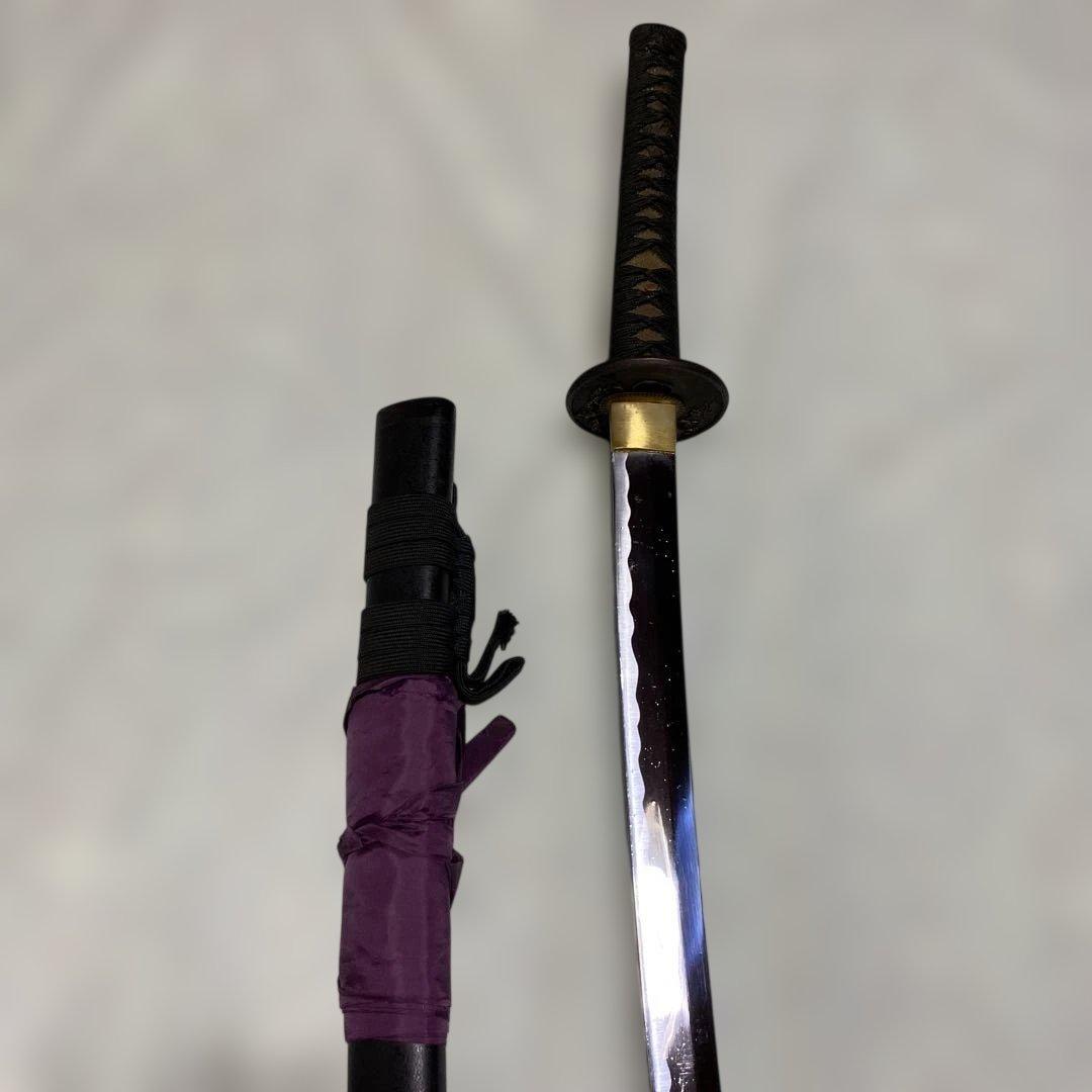 格安模造大刀(刀袋付) 黒柄灰色鮫皮 鶴松図楕円鍔